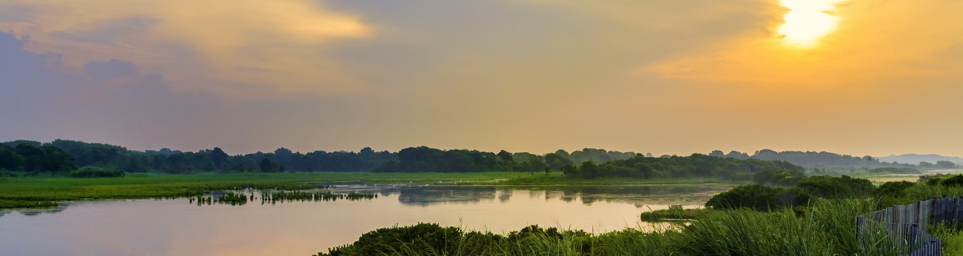 dramatic sky over natural wetlands